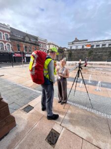 Photo of Jonathan Kemp and backpack on his walking challenge for Aware